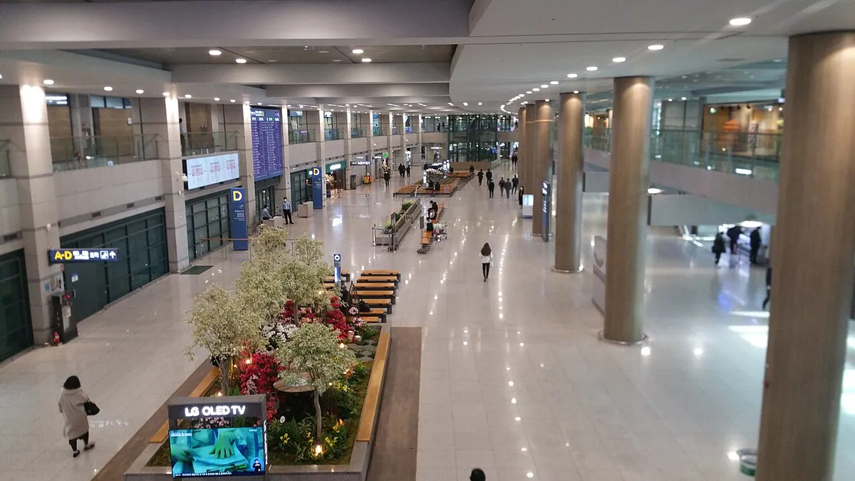 Few people in arrival hall at Incheon International Airport Terminal 1 during the coronavirus outbreak 20200306 114257
